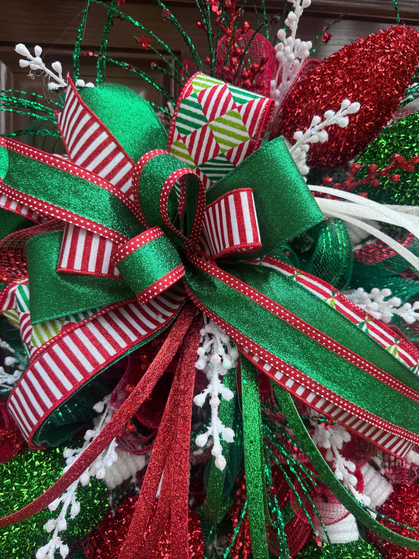 Whimsical Christmas Wreath with Glittered Lights and Ribbons – Red and Green Holiday Door Decor