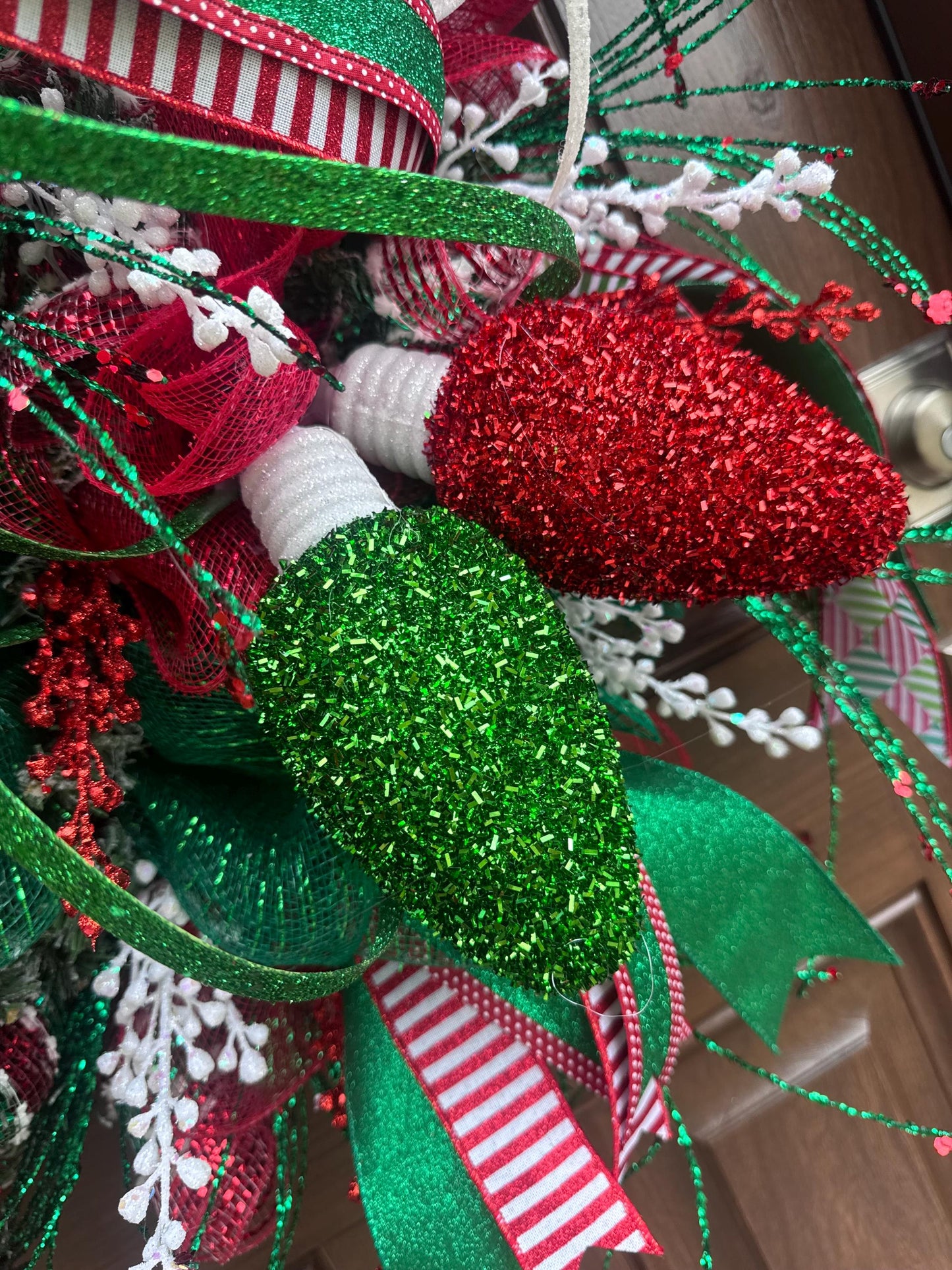 Whimsical Christmas Wreath with Glittered Lights and Ribbons – Red and Green Holiday Door Decor