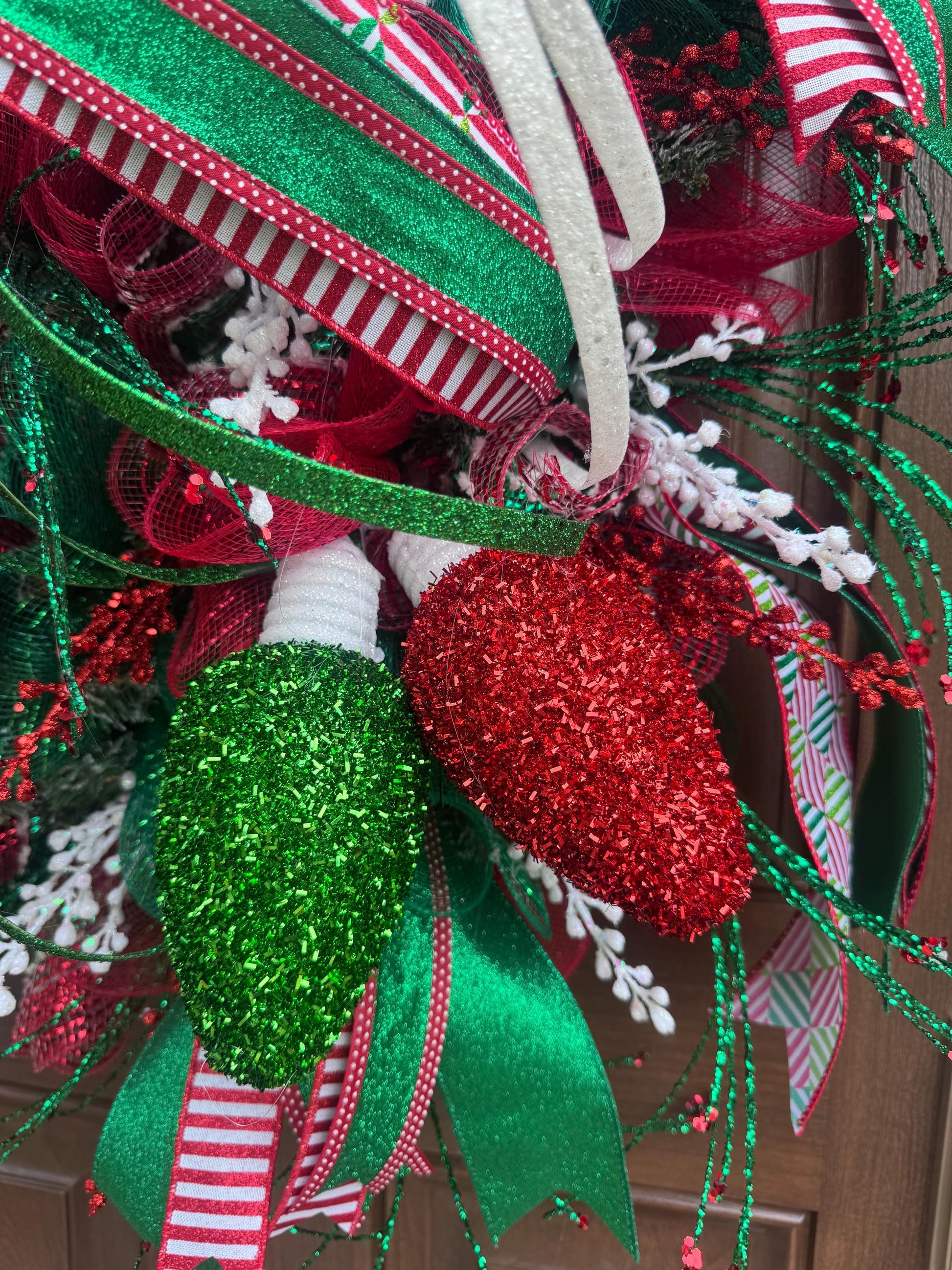 Whimsical Christmas Wreath with Glittered Lights and Ribbons – Red and Green Holiday Door Decor